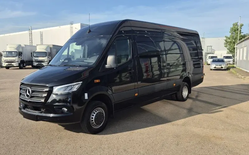 Black Mercedes Sprinter passenger van